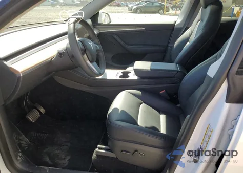 2023 Tesla Model Y из США, поврежденный, VIN 7SAYGDEE0PA069003